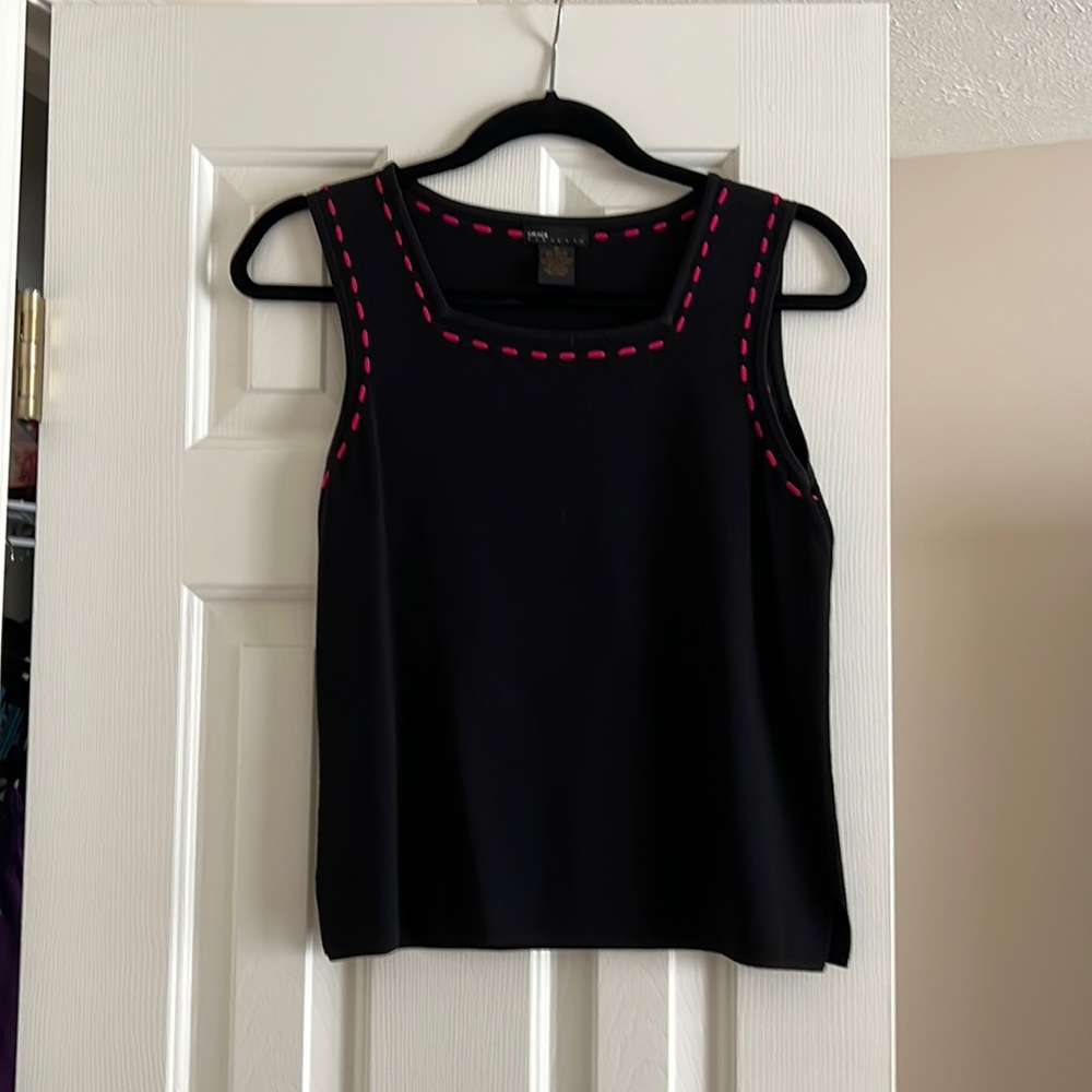 Black knit top with  63% Rayon with 37% nylon